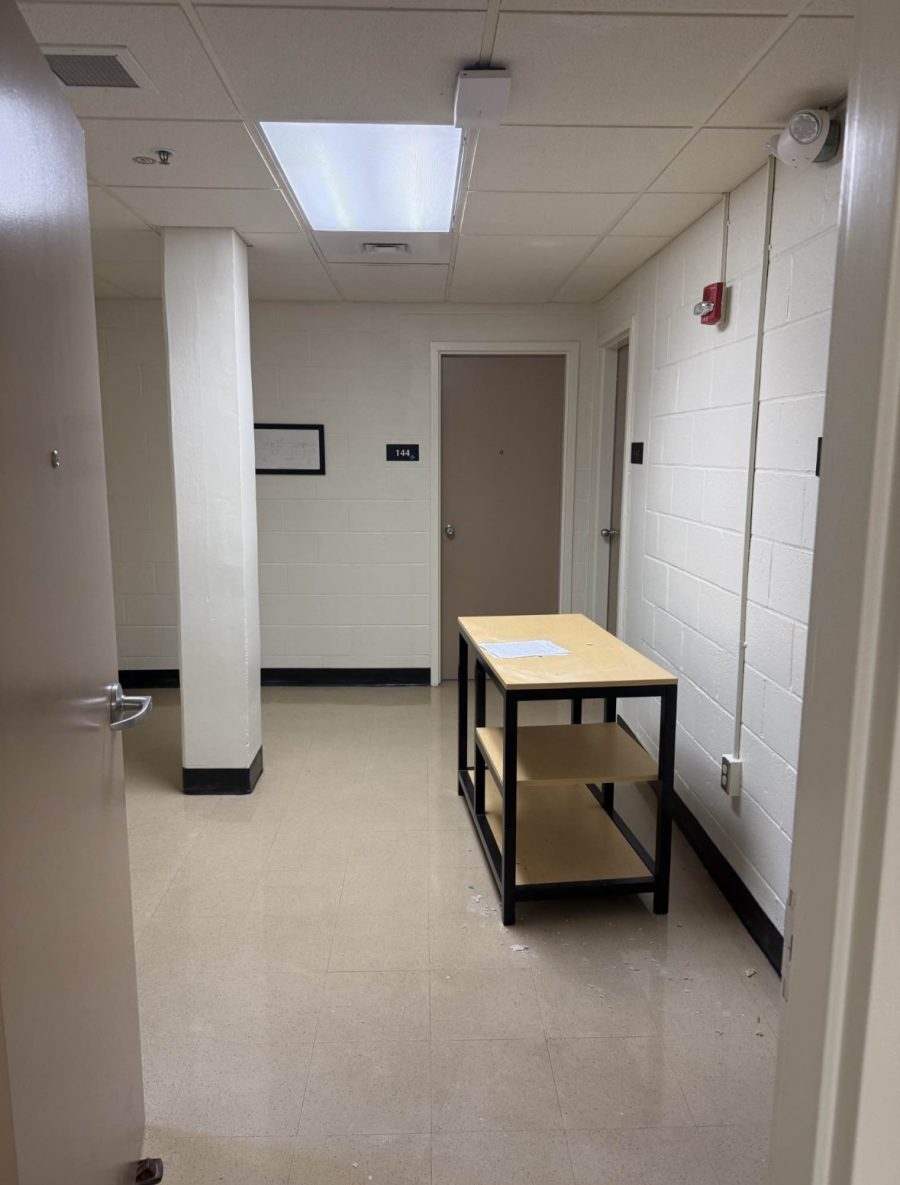 repainted dorm room with furniture pushed to center of room Preview Image 2