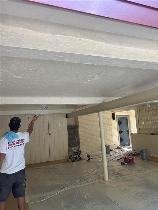 painter working on covered car park roof Preview Image 4