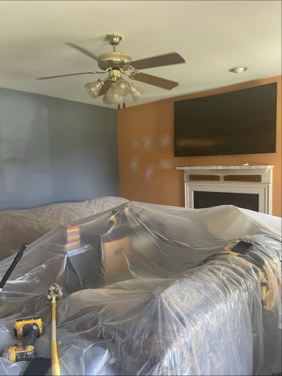 family room with furniture under plastic Preview Image 1
