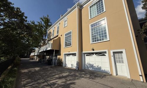 Color-Matched Stucco and Bright Trim