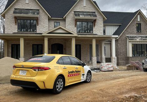 certapro car in front of house