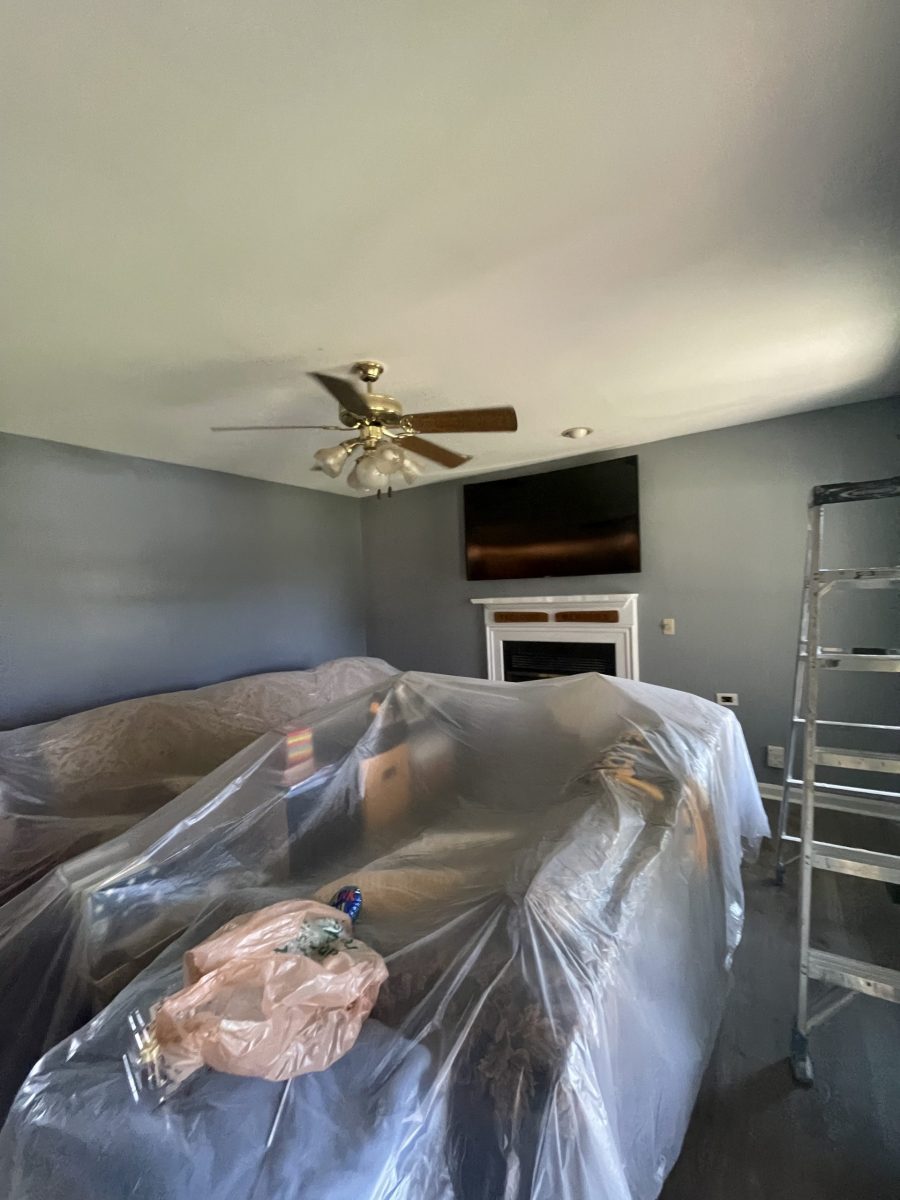 family room with furniture under plastic Preview Image 2