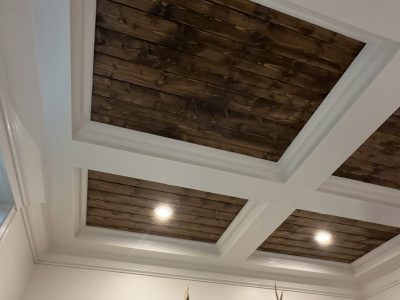 white painted ceiling with wooden recessed panels