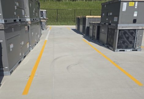 loading area lot with fresh painted striping and hvac equipment