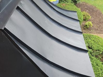 black painted metal awning above house window