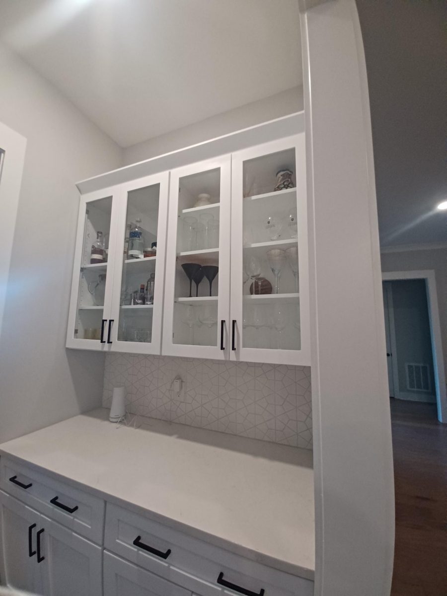 white kitchen counters and glass-front cabinets Preview Image 1