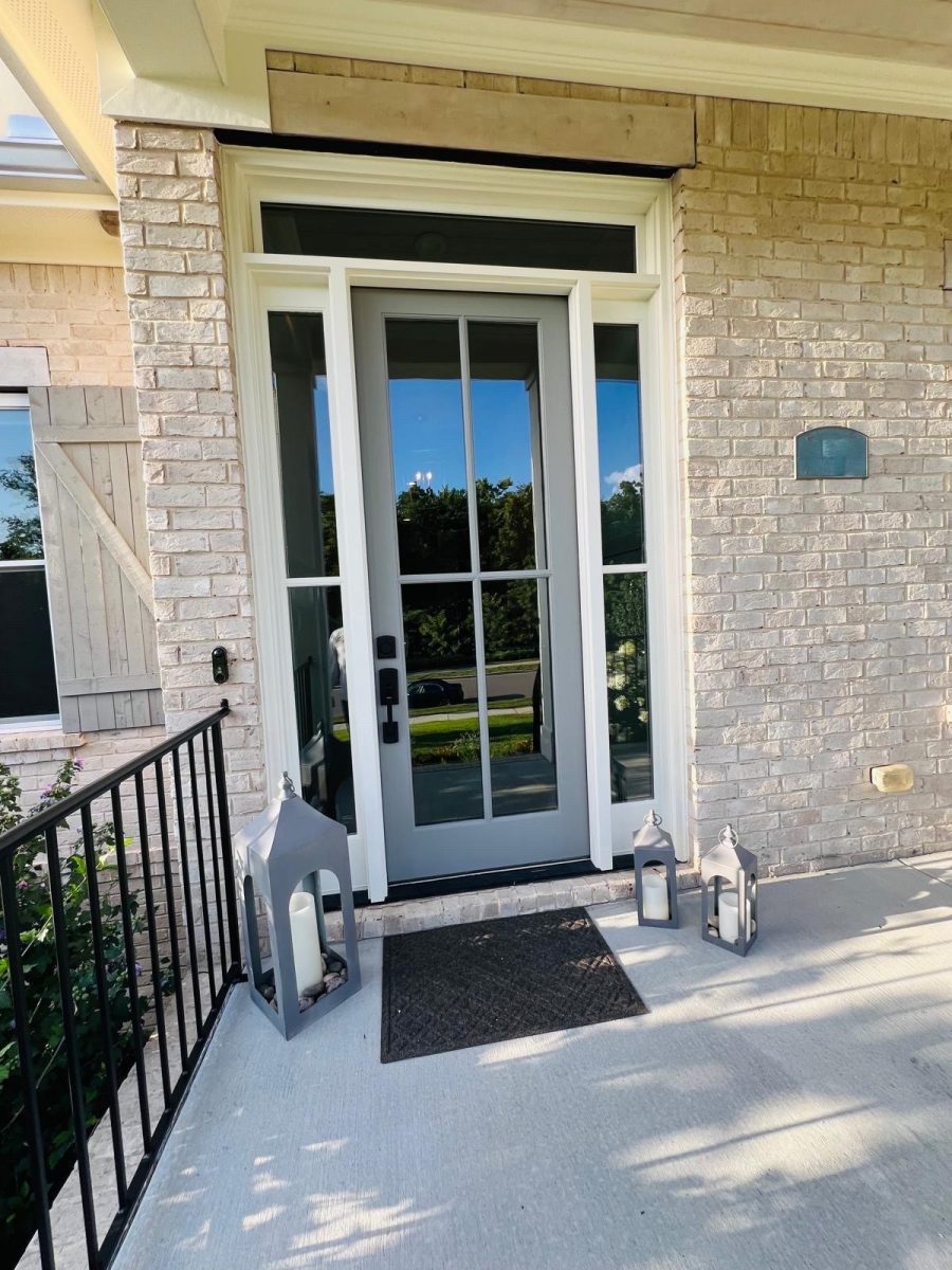 glass-front door on brick house Preview Image 2