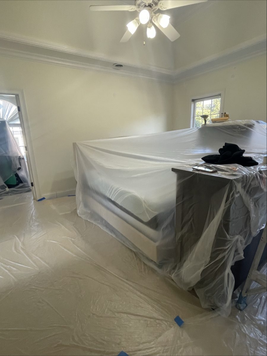 bedroom with plastic sheeting for painting Preview Image 3