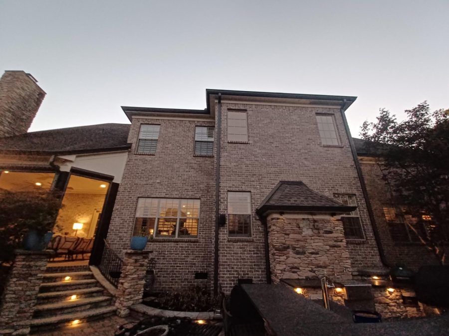 brick home with painted trim and shutters Preview Image 2