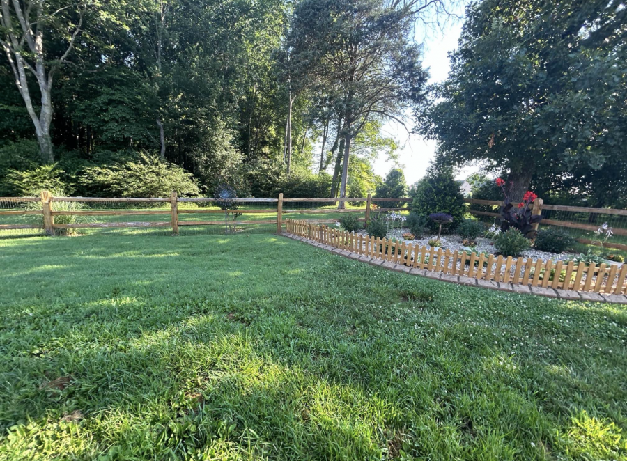 wooden fence surrounding home Preview Image 12