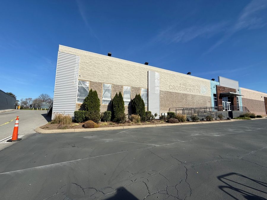 church exterior with plastic sheeting on windows before repaint Preview Image 1