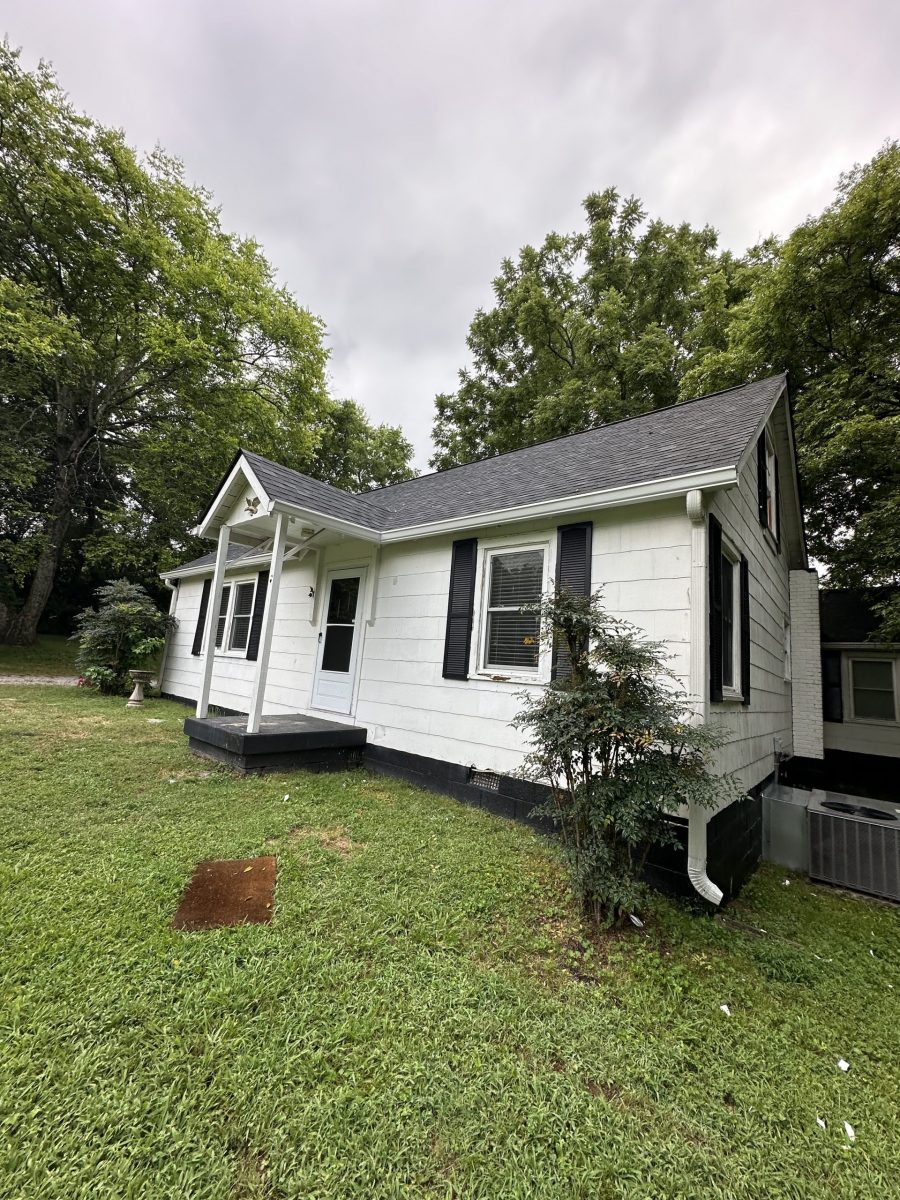 front of house with white siding and black shutters Preview Image 13