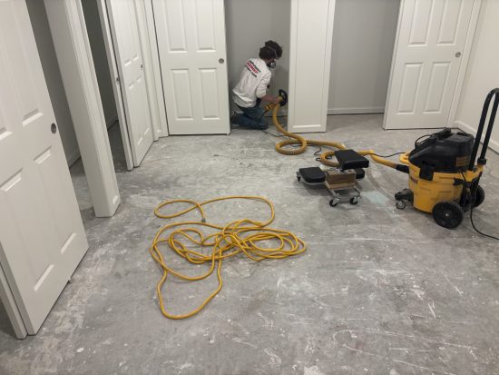 person working on flooring update
