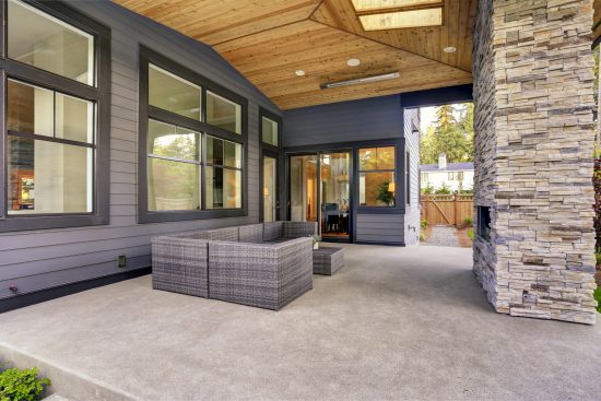 Concrete Patio with a fireplace
