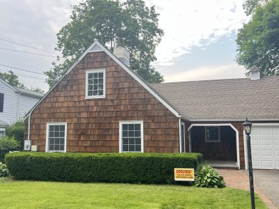 Restored cedar shinges on exterior of house in Manhasset, NY