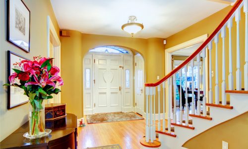 yellow painted foyer interior