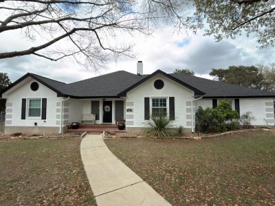 house exterior with white siding and black trim and accents