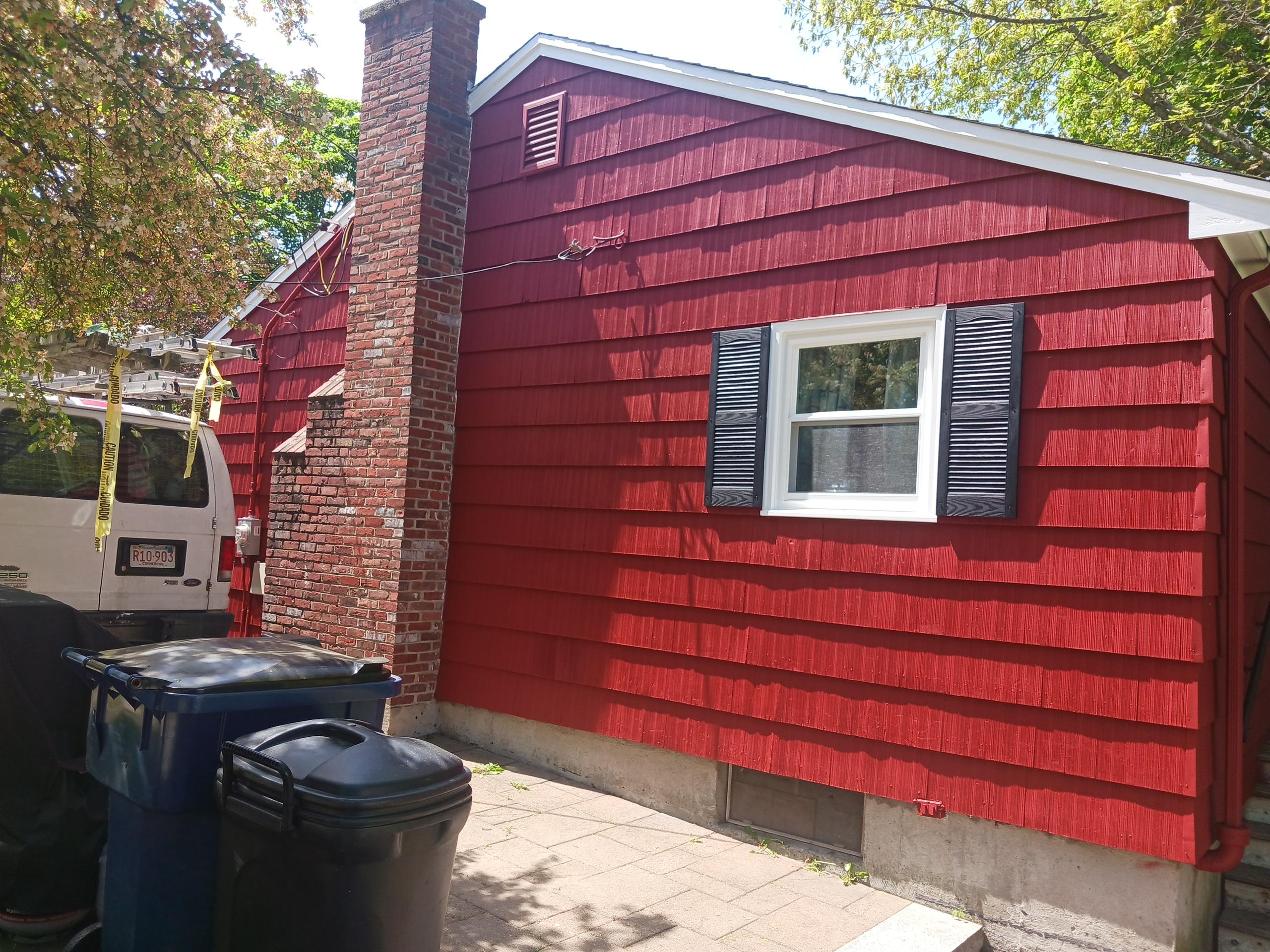 residential exterior home painted red