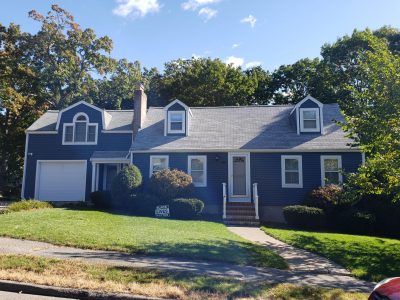 Blue house in Needham, MA