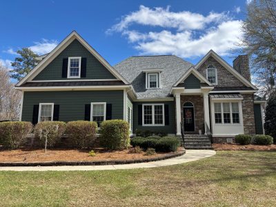 house exterior with green painted siding