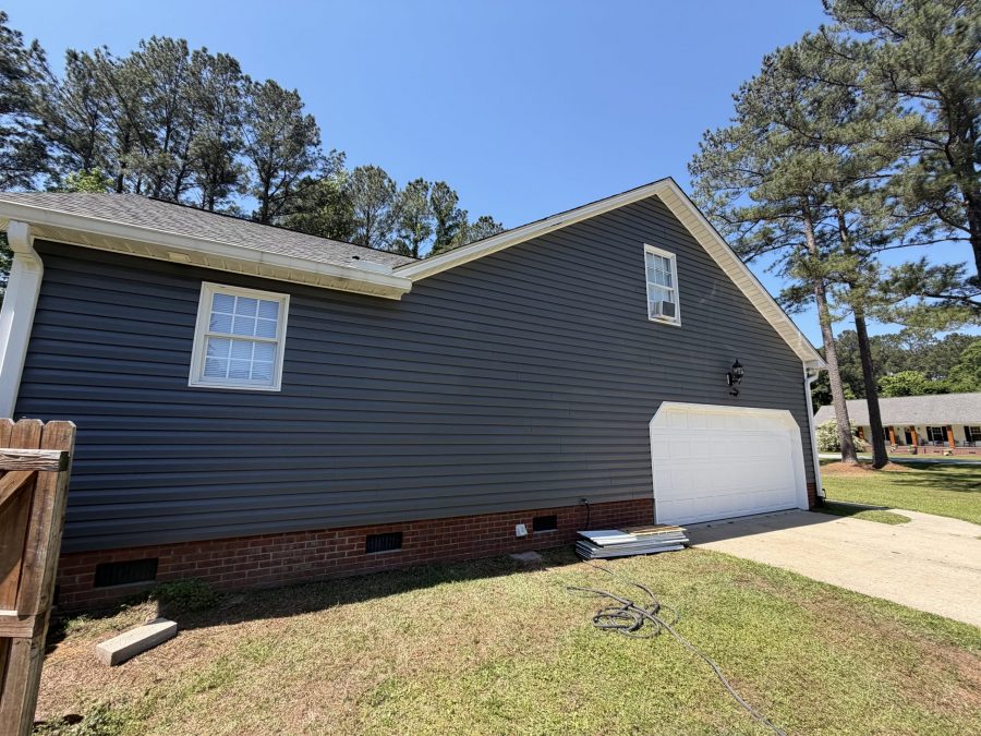 house exterior with painted dark siding Preview Image 2