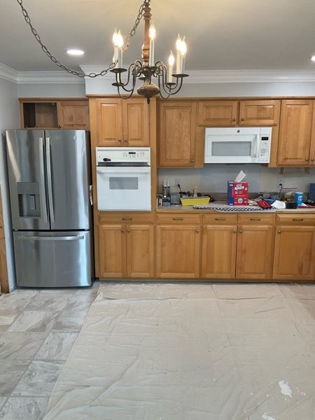 home kitchen with stained wood before repaint Preview Image 2