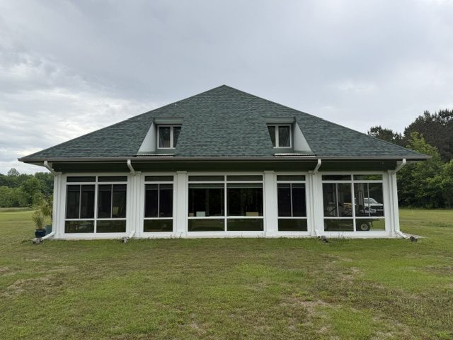 home exterior painted light sage green with darker green trim and accent areas Preview Image 6