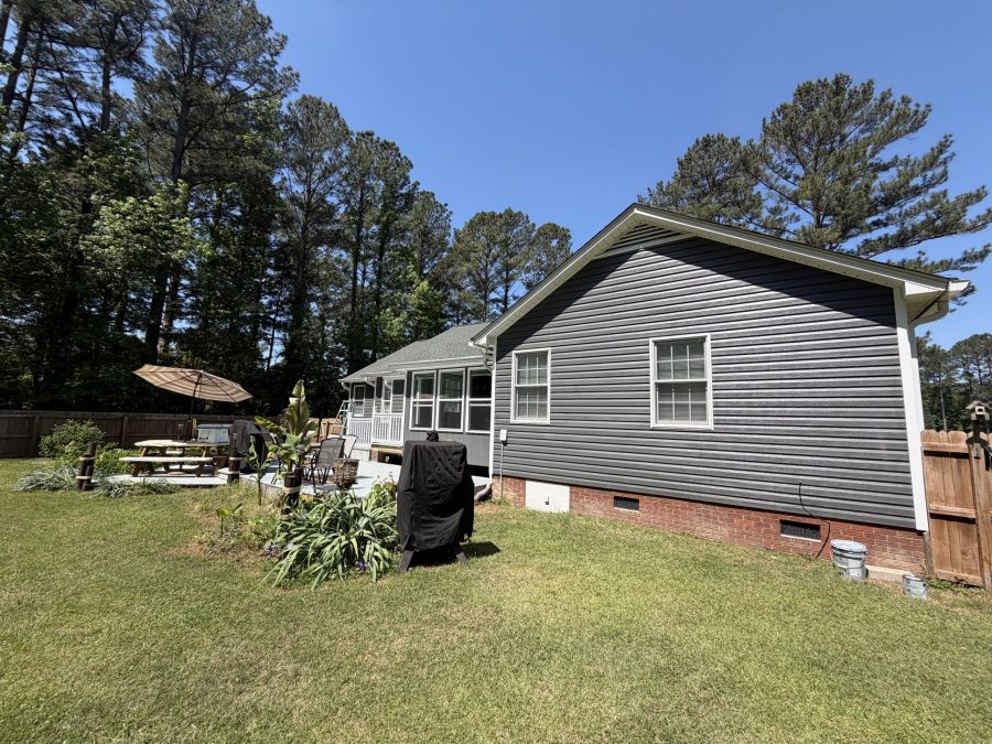 house exterior with painted dark siding Preview Image 1
