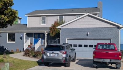 painted brick coastal home exterior