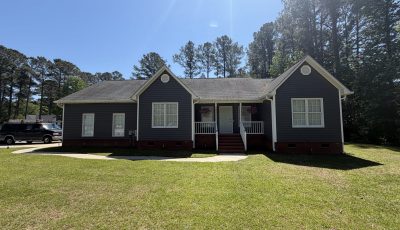 house exterior with painted dark siding