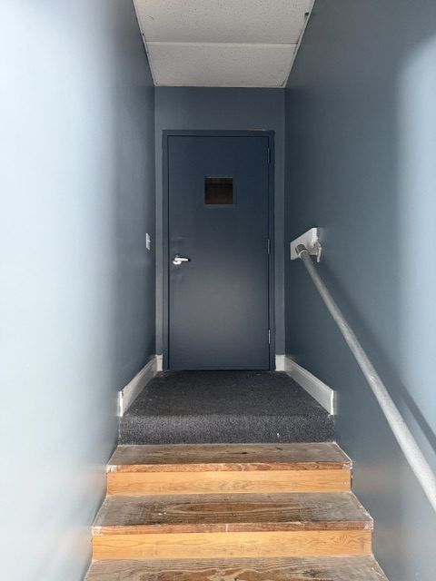 dark grey painted commercial facility door and surrounding wall Preview Image 6