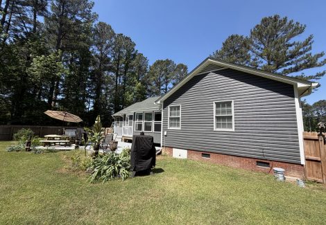 house exterior with painted dark siding