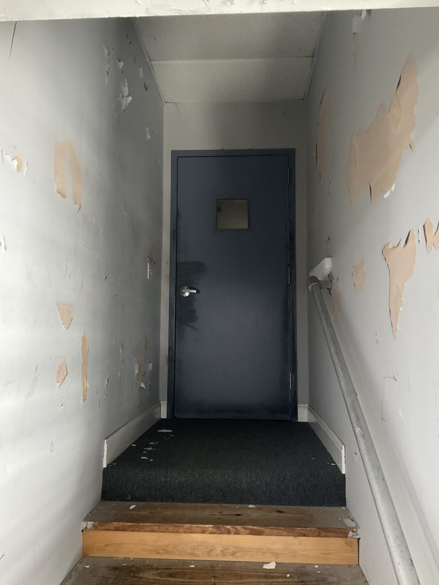interior door and damaged wall of fire deparment facility before repaint Preview Image 7
