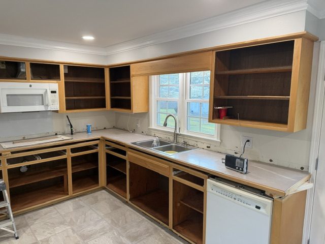 home kitchen with cabinet doors removed before repaint Preview Image 5