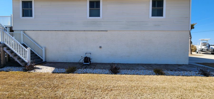 brick and siding house exterior with faded paint Preview Image 7