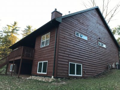 Staining of log home siding and decks