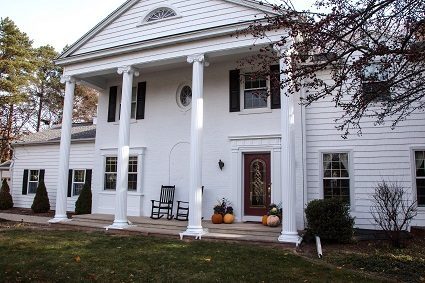 White Colonial with Dark shutters