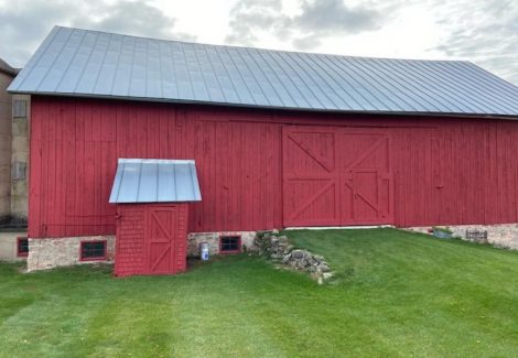 Repainted barn door and siding