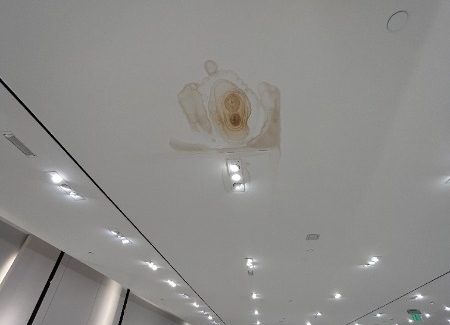 clothing store ceiling with water damage