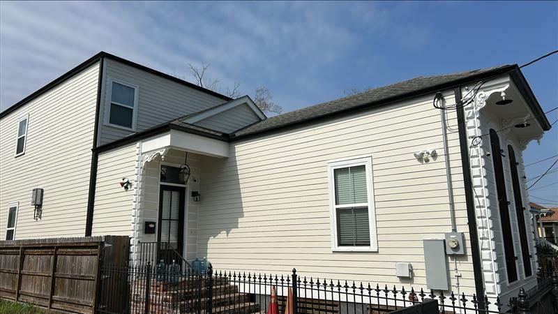 side of house with white painted siding Preview Image 2