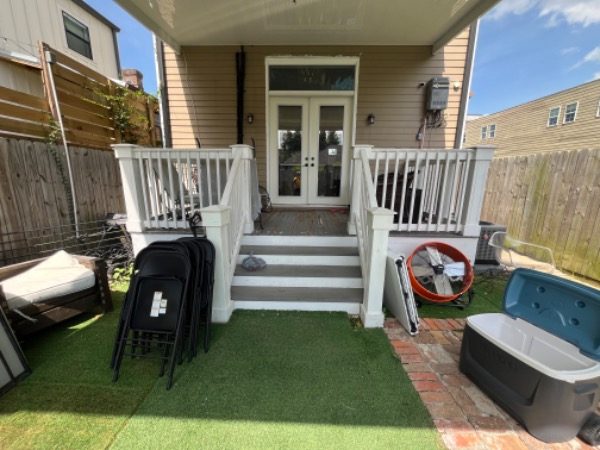 front of home with tan siding and porch Preview Image 7