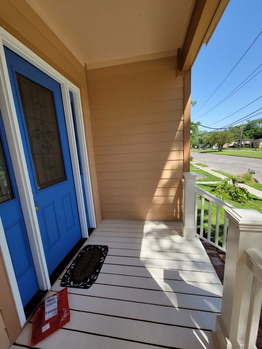 The front door was painted blue. Preview Image 2