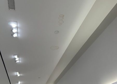 clothing store ceiling with water damage