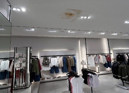 clothing store ceiling with water damage