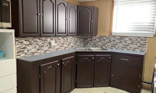 Dark Colored Painted Laundry Cabinets