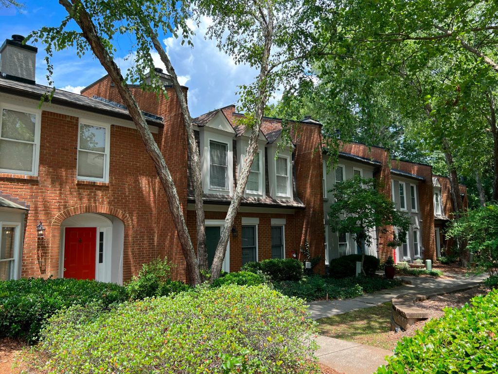 front of apartment buildings after repainting