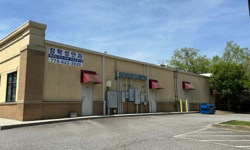 Shopping Plaza Rear Before Painting