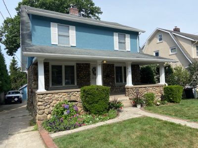 light blue residential exterior painting