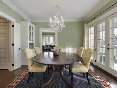 Dining room with green interior paint