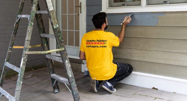Certapro painter adding finishing touches